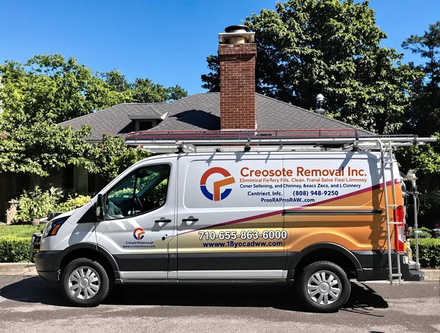 Westerly Chimney Sweep technician removing creosote safely in Westerly, RI